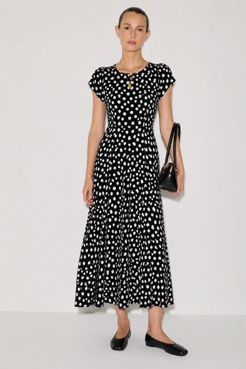 Reformation Dresses & Skirts - Reformation black & ivory polka dot midi dress